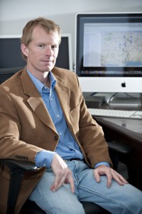 Dr. Robert McMillen sitting at his desk